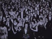The photograph, captioned Overlook Hotel, July 4th Ball, 1921. A young Jack stands smiling in the bottom center.