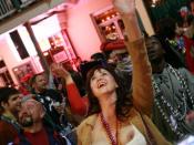 New Orleans Mardi Gras: Revelers on the tourist section of Bourbon Street.