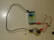Gel electrophoresis, in this case used to separate different dyes. This techniques is used in DNA profiling.