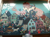 English: This picture has been made to a mural at the facade of a toy-shop in Bremen, Germany. Español: Esta foto es de un mural en la fachada de una tienda de juguetes en Bremen, Alemania.