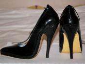 English: A pair of high heeled shoe with 12cm stiletto heels. Category:Shoes