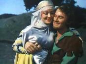 Cropped screenshot of Olivia de Havilland and Errol Flynn from the trailer for the film The Adventures of Robin Hood