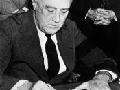 English: United States President Franklin D. Roosevelt signing the declaration of war against Japan, in the wake of the attack on Pearl Harbor.