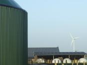 English: Renewable Energies: Biogas (fermenter), wind power and photovoltaics on a farm in Horstedt (Schleswig-Holstein/ Germany) Deutsch: Erneuerbare Energie: Biogas (Fermenter), Windkraftanlage und Photovoltaik-Paneele (Solarzellen) auf einem landwirtsc