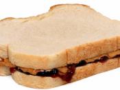 English: A peanut butter and jelly sandwich, made with Skippy peanut butter and Welch's grape jelly on white bread.