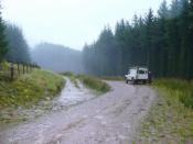 English: Waiting in the rain The National Park rangers are attempting to intercept illegal 4x4 and motorbike activity on the restricted byway in Cwm Callan.