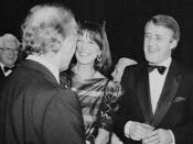 Mila (left) and Brian (right) Mulroney greet Rt. Hon. Pierre Trudeau (Foreground).
