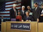 President Bush signing the bipartisan No Child Left Behind Act at Hamilton H.S. in Hamilton, Ohio.