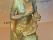 A statue of Isis nursing her son, housed in the Louvre