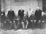 English: Edmund Barton, Australia's first Prime Minister, is seated second from the left, surrounded by the Federal Executive Council, comprising his Cabinet ministers and the Governor-General, Lord Tennyson. Standing at the rear, left to right are : Jame