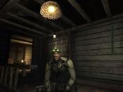 Sam Fisher, protagonist of the Tom Clancy's Splinter Cell video game series, in a camouflage suit, during a mission in Pandora Tomorrow.