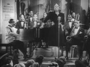 Cropped screenshot of Count Basie and his band with featured vocalist Ethel Waters from the film Stage Door Canteen.