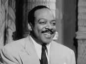 This is a screen capture of Count Basie at the piano from the movie 