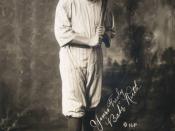 Babe Ruth, full-length portrait, standing, facing slightly right, in baseball uniform, holding baseball bat. Facsimile signature on image: 