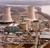 Color photograph of the Three Mile Island nuclear generating station, which suffered a partial meltdown in 1979. The reactors are in the smaller domes with rounded tops (the large smokestacks are just cooling towers).