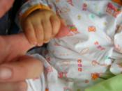 grasp reflex of a 5 month old baby boy.
