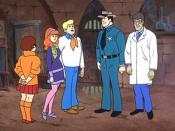 Every episode of the original Scooby-Doo format contains a penultimate scene in which the kids unmask the ghost-of-the-week to reveal a real person in a costume, as in this scene from 