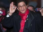 Indian actor Shah Rukh Khan leaving the press conference for the film 