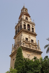 The clocktower, former minaret, of the cathedral (former mosque) of Cordoba, Spain. View from the Orange trees Courtyard.