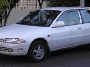The front of a first generation Proton Satria, in Bangsar, Malaysia.