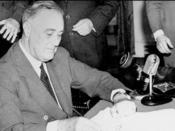 President Roosevelt signs the Selective Service Training and Service Act on Sept. 16, 1940, establishing the first peacetime draft and creating the Selective Service System