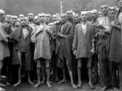 English: Starved prisoners, nearly dead from hunger, pose in concentration camp in Ebensee, Austria. The camp was reputedly used for 