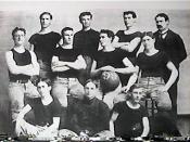 English: First basketball team at the University of Kansas, 1899. Coach James Naismith is on the far right.