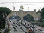 The Kota Darul Ehsan arch, bordering the Kuala Lumpur-Selangor border, Malaysia. Taken from a moving Kelana Jaya Line train.