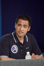 Malaysian spaceflight participant responds to a query from the media during an pre-flight press conference at the Johnson Space Center.
