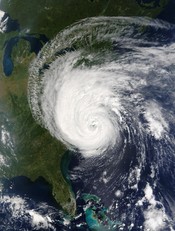 The eye of Hurricane Isabel approaches North Carolina's Outer Banks in this true-color Moderate Resolution Imaging Spectroradiometer (MODIS) image captured by the Terra satellite on September 18, 2003 at 11:55 am US Eastern time.