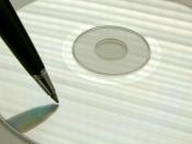 English: Compact disk and pen
