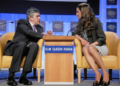 DAVOS/SWITZERLAND, 25JAN08 - Gordon Brown, Prime Minister of the United Kingdom and H.M. Queen Rania Al Abdullah of the Hashemite Kingdom of Jordan, Member of the Foundation Board of the World Economic Forum, talk to each other during the session 'Corpora
