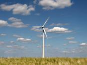 English: Modern wind energy plant in rural scenery. Français : Une éolienne moderne dans un paysage rural.