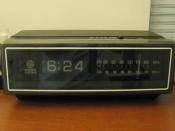 Mid-1970s digital alarm clock radio (AM/FM) using split-flap display