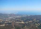 English: Ventura, viewed from the northwest; the Ventura/San Miguelito Oil Field is in the foreground (July 31, 2009).