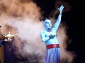 Actor portraying blue Genie character in Disney's Aladdin stage show