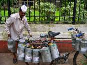 A collecting Dabbawala on a bicycle
