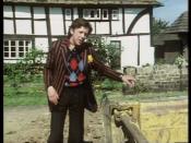 David Dixon as Ford Prefect in Episode One of the TV adaptation of The Hitchhiker's Guide to the Galaxy