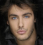 English: An image of Kostas Martakis (source below), digitally blurred, in order to demonstrate that a greater pixel count does not necessarily mean a higher quality image.