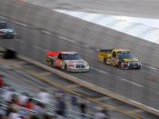 NASCAR drivers Mike Skinner (NASCAR) (#5 on left) battling Todd Bodine at the Texas Craftsman Truck Series race