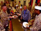 U.S. President George W. Bush meets with troops and serves Thanksgiving Day Dinner at the Bob Hope Dining Facility, Baghdad International Airport, Iraq,, Nov. 27.2003 (http://www.defenselink.mil/news/newsarticle.aspx?id=27709)