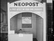 Stall at a trade fair advertising and displaying Neopost 