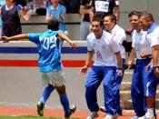 Enrique Meza, Jr. and others rejoicing with his Under 17 Team player who scored a goal for Cruz Azul