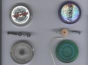 Two high-tech yo-yos, both take-apart models using the 