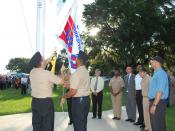 US Navy 100818-N-3436L-002 Sailors raise the new Occupational Safety and Health Administration (OSHA) flag for achieving OSHA's Voluntary Protection Program