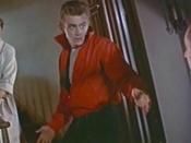 Cropped screenshot of Ann Doran, James Dean and Jim Backus in the trailer for the film Rebel Without a Cause