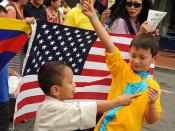 Two boys, Tibetan people parade for World Peace with Tibetan & American Flags, near Verizon Center where Kalachakra is being given by His Holiness the 14th Dalai Lama, Washington D.C., USA