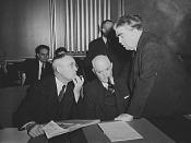 War Labor Board anthracite hearing. John L. Lewis (right, President of the United Mine Workers (UMW), confers with Thomas Kennedy (left), Secretary-Treasurer of the UMW, and Pery Tetlow (center), president of UMW District 17, at the War Labor Board confer