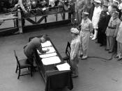 Umezu signing the instrument of surrender to the United States