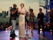 West taking the microphone from Swift at the 2009 MTV Video Music Awards.